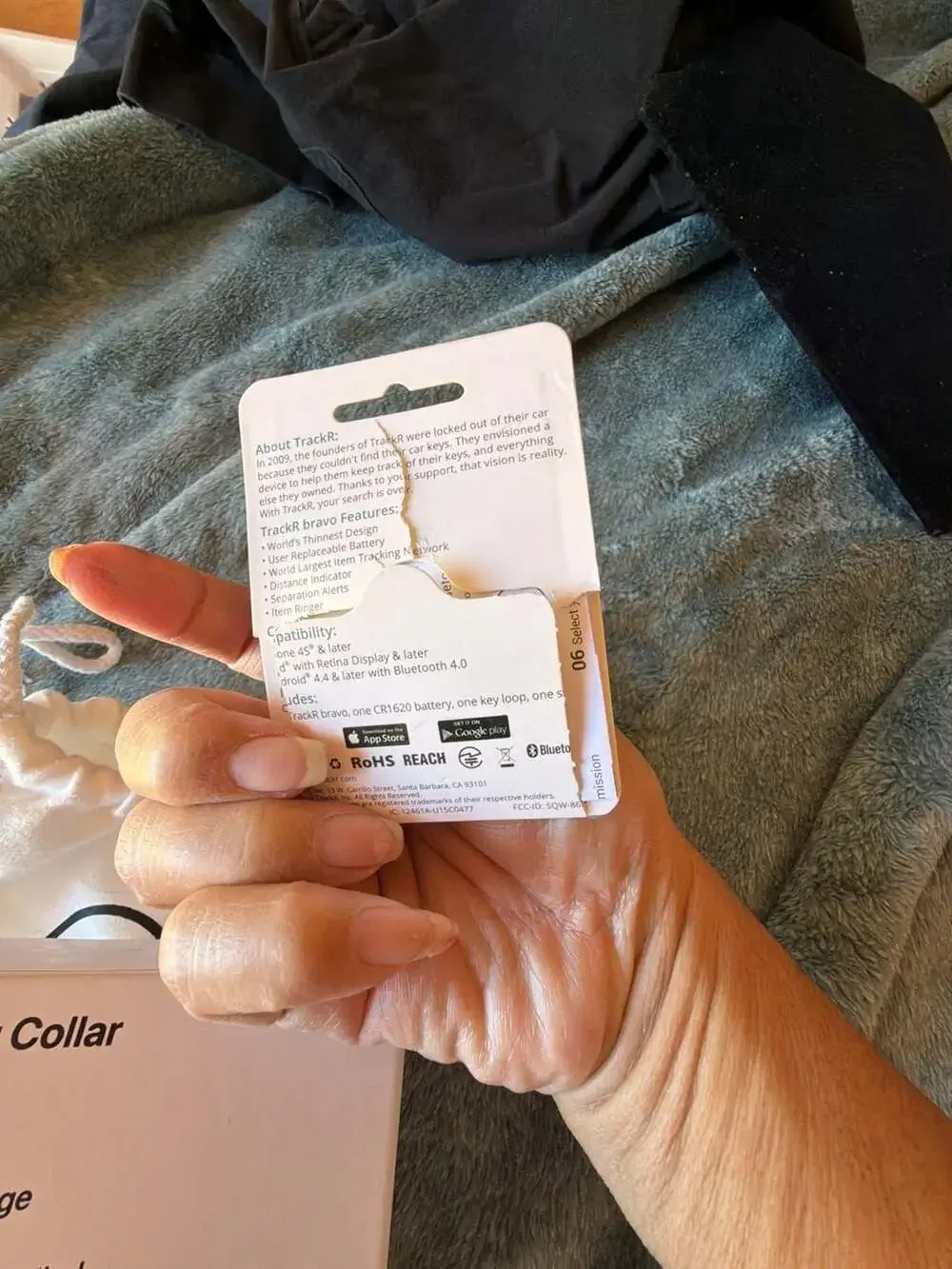 TagLock Leather AirTag Collar Holder Brown with a TrackR bravo device